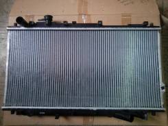 Радиатор охлаждения двигателя. Kia Spectra Kia Shuma Kia Sephia Kia Carens