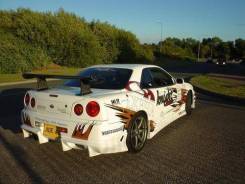 Задний бампер Nissan Skyline R34 2дв BOMEX