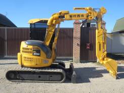 Komatsu PC30UU. Японский экскаватор Komatsu с Телескопической стрелой, 0,15 куб. м.