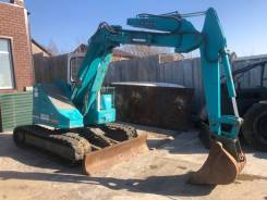 Kubota. Японский полноповоротный экскаватор RX501