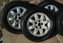 Комплект Bridgestone Blizzak Revo GZ на дисках Mitsubishi. 6.0x15" 5x114.30 ET46 ЦО 67,1 мм.