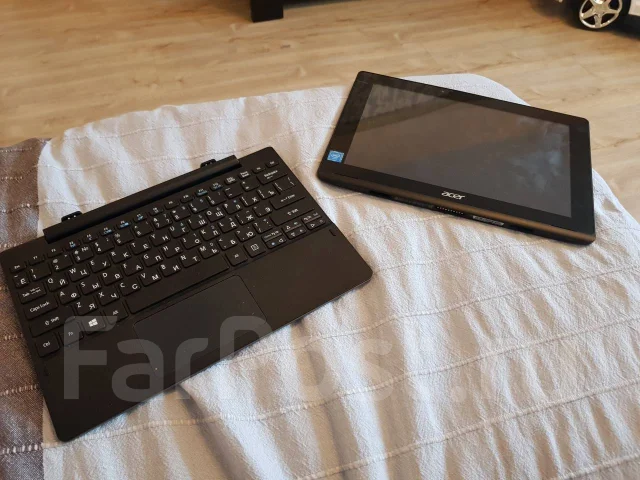 Acer Aspire Switch 10. 10.1", 1,8����, ��� 2048 ��, ���� 64���, WiFi: 1, Bluetooth: 1, ����������� �� 4��. ����