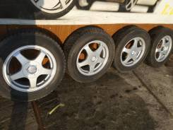 Комплект литых колес 195/65R-15 с зимней резиной Autobacs Nord Trek. 6.0x15" 5x100.00, 5x114.30 ET48 ЦО 73,0 мм.