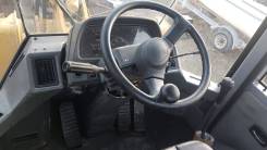 TCM. Фронтальный погрузчик , 2 500 кг., Дизельный, 2,00 куб. м.