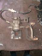 Суппорт тормозной. Toyota Corolla, ADE150, AZE141, NDE150, NRE150, ZRE142, ZRE151, ZZE150 Двигатели: 1ADFTV, 1NDTV, 1NRFE, 1ZRFAE, 1ZRFE, 2AZFE, 2ZRFE...