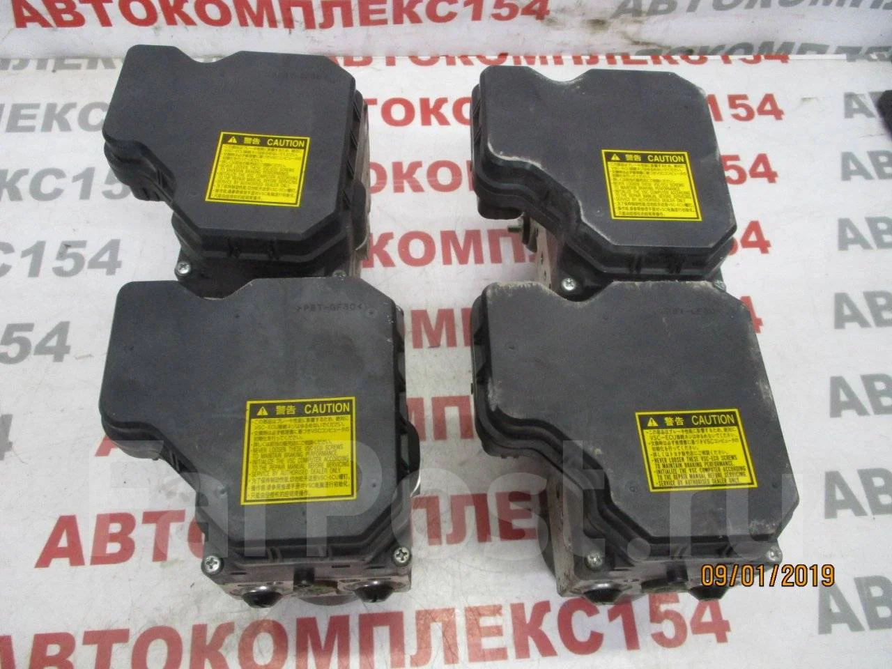 Блок управления абс камри 40 где находится