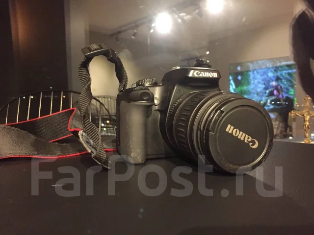 Canon EOS 1000D ����