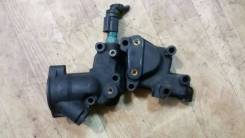 Корпус термостата. Citroen C3, F, HB Peugeot 206, 2A, 2B, 2E/K, 2A/C Двигатели: DV4TD, ET3J4, TU1JP, TU3A, TU3JP
