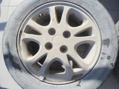 Daihatsu на R14 4x100 шипы Nankang 175/65 всборе. 5.0x14" 4x100.00 ET35 ЦО 54,1 мм.