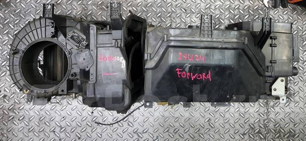 Заслонки печки исузу н. Печка исузу форвард. Корпус печки на исузу нпр 75. Печка исудзу форвард. Исузу nqr75 моторчик печки.