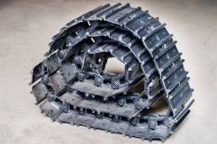 Гусеница. Airman Bobcat Case Caterpillar Daewoo Ditch Witch Furukawa Hanix Hitachi Hyundai IHI JCB Kato Kobelco Komatsu Kubota Mitsubishi Morooka New...