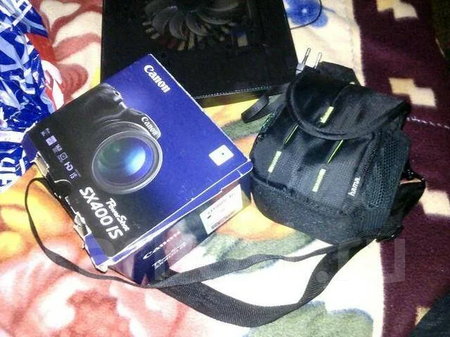 Canon PowerShot SX400 IS. 15 - 19.9 ��, ���: 14� � ����� ����