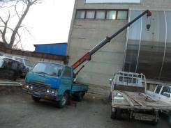 Mazda Titan. Манипулятор стрела 5.5 метра, 2 500 куб. см., 1 500 кг., 4x2