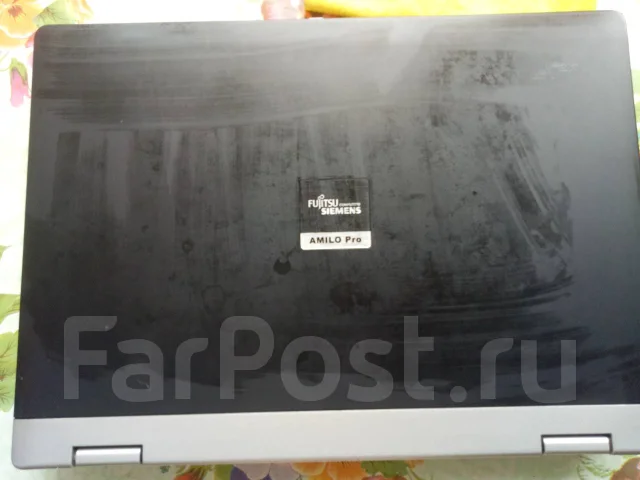 Fujitsu Siemens Amilo. 15.4", 1,7����, ��� 1024 ��, ���� 160���, WiFi: 1, Bluetooth: 1, ����������� �� 3��. ����