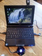Asus Eee PC 900AX. 8.9", 1,6����, ��� 1024 ��, ���� 160���, WiFi, ����������� �� 2��.