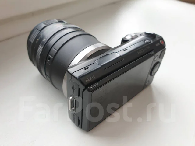 Sony Alpha NEX-5. 10 - 14.9 �� ����