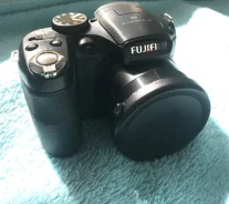 Fujifilm FinePix S2950. 10 - 14.9 ��, ���: 14� � ����� ����