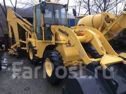 Komatsu WB70A. Экскаватор-погрузчик, 0,70 куб. м.