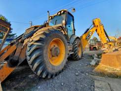 JCB 4CX. Экскаватор-погрузчик ECO 2011 года выпуска, 1,20 куб. м.