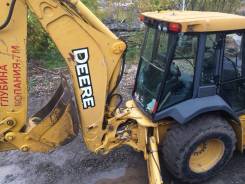 John Deere. Экскаватор-погрузчик