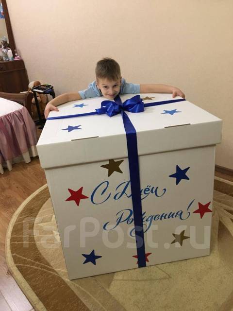 Упаковка новогодних подарков в большие подарочные коробки