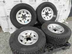 Оригинальные диски Toyota на шинах Bridgestone 265/70R15. 7.0x15" 6x139.70 ET8