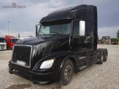 Volvo VNL 670. Седельный тягач , 14 950 куб. см., 15 127 кг., 6x4