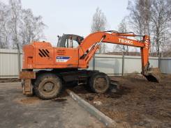 Твэкс ЕК-12. Экскаватор колесный , 0,65 куб. м.
