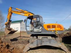 Эксмаш E140W. Колесный экскаватор Exmash E140W, 0,65 куб. м.
