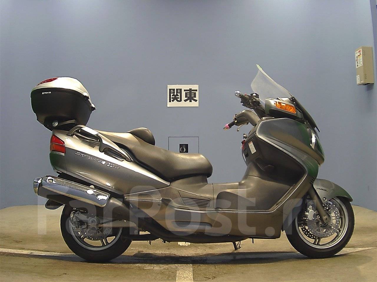 Suzuki burgman 650 lx. Макси скутер suzuki burgman 650. Burgman 650 фара. Судзуки бургман 650. Скутер 650 кубов.