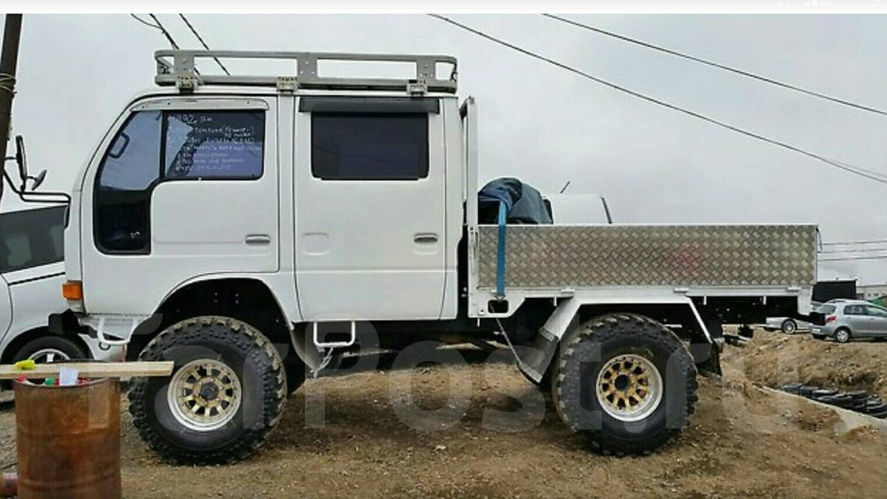 Nissan Atlas 4wd двухкабинник. Toyota Dyna 4x4 двухкабинник. Nissan Atlas 4x4 двухкабинник. Тойота Дюна на Мостах 4х4.