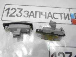 Фонарь подсветки номерного знака Mitsubishi Outlander CW5W в Новосибирске Фонарь подсветки номерного знака Mitsubishi Outlander CW5W