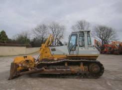 Komatsu D65EX. Бульдозер D65EX-12, 11 000 куб. см., 16 535 кг.