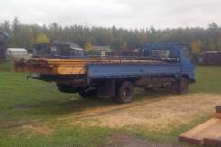 Mazda Titan. Продается 1992 г. в., длина борта 5,2 м, 4х2, 4 553 куб. см.
