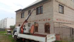 Isuzu Elf. c манипулятором и аппарелью, 3 300 куб. см., 2 000 кг., 4x2