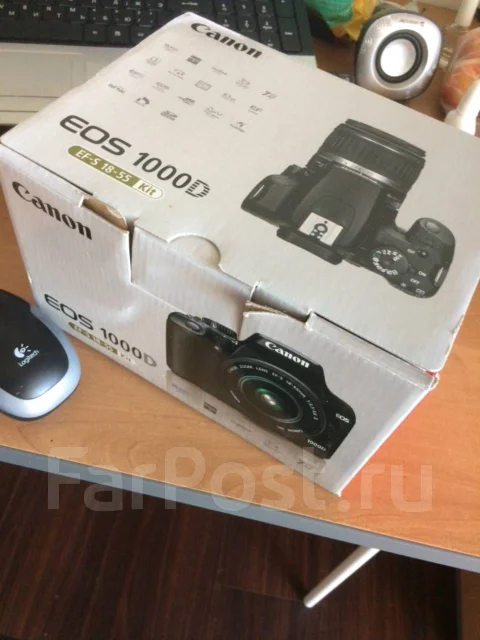 Canon EOS 1000D ����