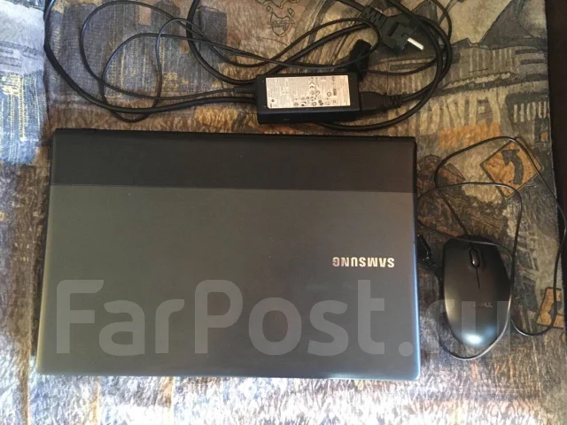 Samsung 300E5C. 15.6", ��� 6 ��, ���� 750���, WiFi: 1, Bluetooth: 1, ����������� �� 1 000��. ����