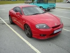 Hyundai Tiburon. KMHHN61FP8U284628 ����