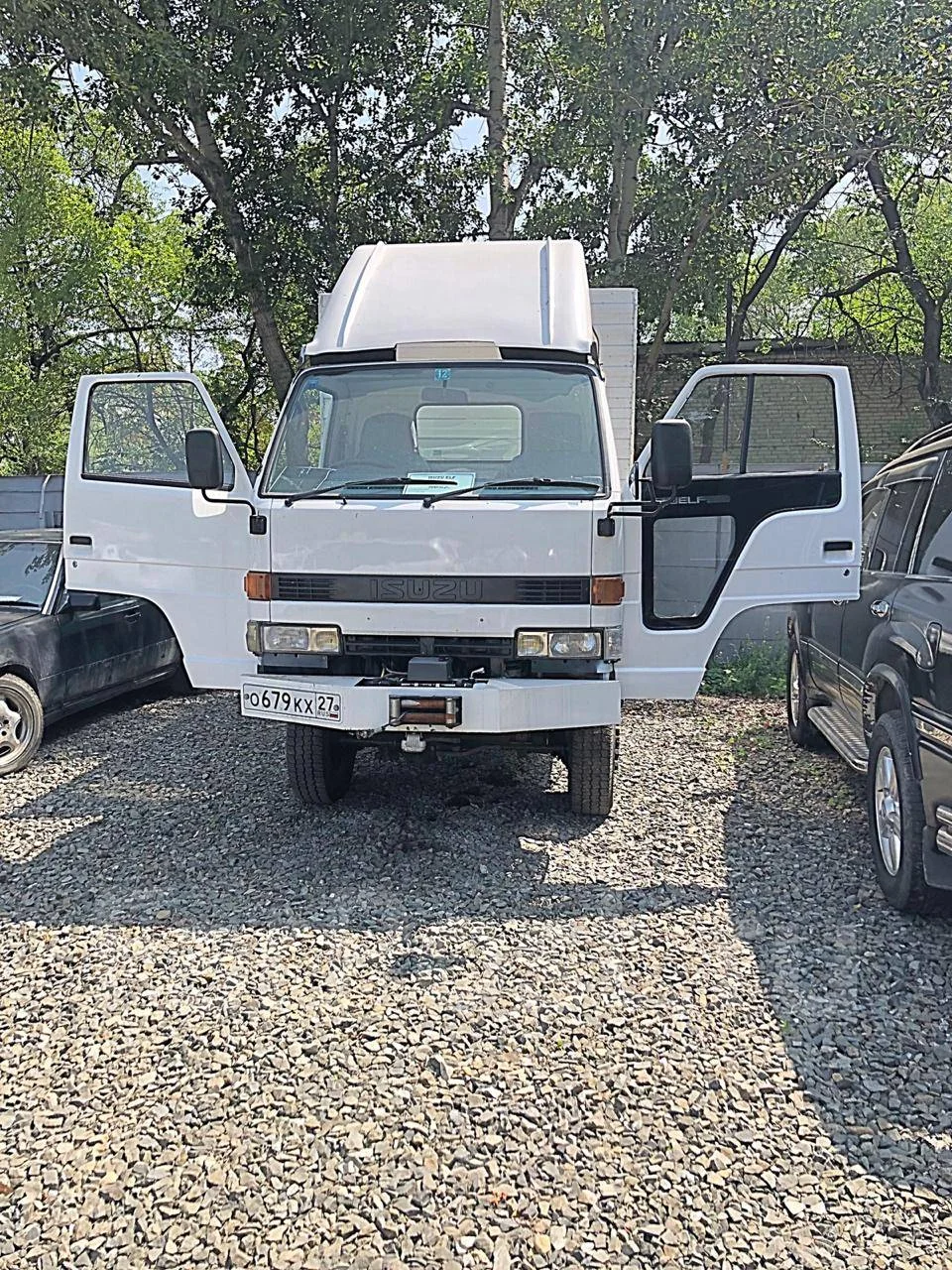 Грузовик исузу эльф мостовой самосвал. Исузу 47052а. Isuzu forward 2004. Исузу эльф 2002 года. Исузу категории в.