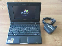 Asus Eee PC 701. 7", 0,9����, ��� 2048 ��, ���� 4���, WiFi: 1, ����������� �� 1��. ����