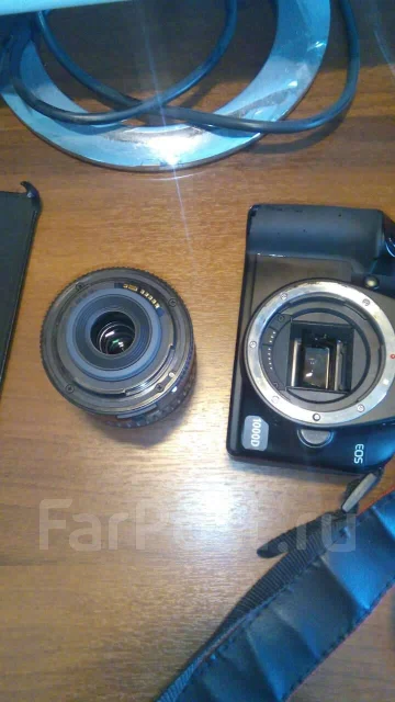 Canon EOS 1000D ����