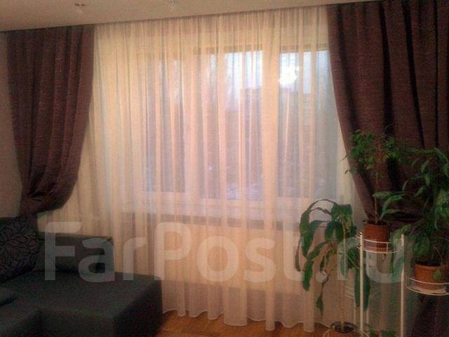 Как красиво повесить шторы в зале фото в квартире