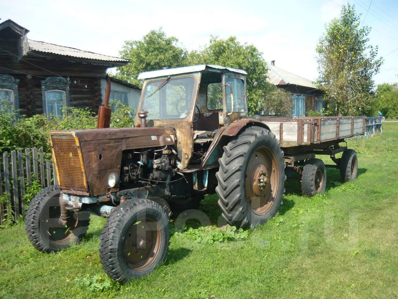 Авито мтз 50 бу. МТЗ-50 трактор. МТЗ 50 С прицепом. МТЗ-50 трактор с прицепом. МТЗ 50 С телегой.