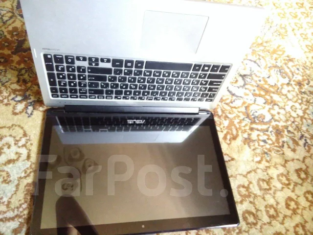 Asus Transformer Book. 15.6", 1,7����, ��� 6 ��, ���� 750���, WiFi: 1, Bluetooth: 1, ����������� �� 6��. ����
