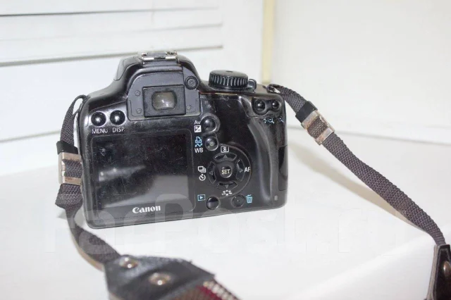 Canon EOS 1000D ����