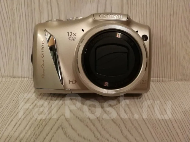 Canon PowerShot SX130 IS. 10 - 14.9 ��, ���: 12� ����