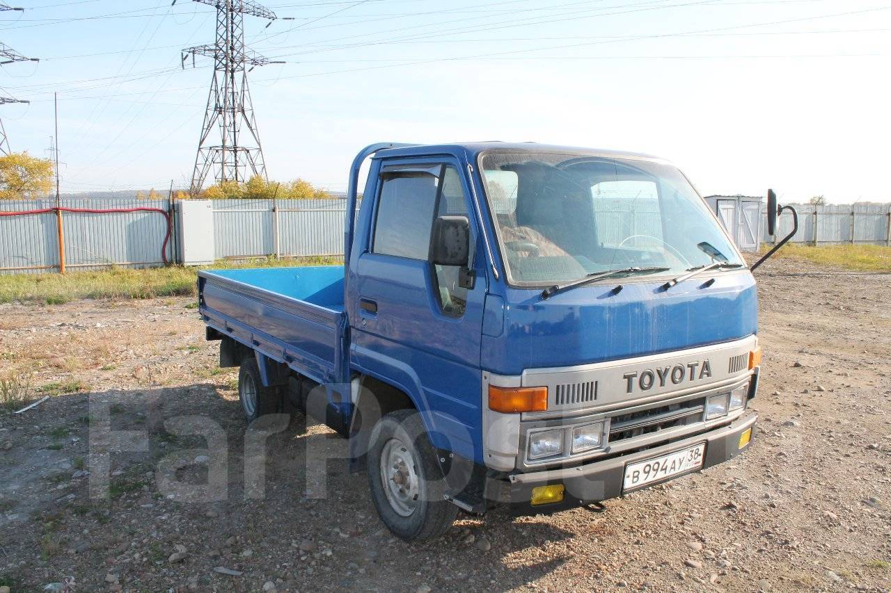 Купить грузовик бу иркутской области. Toyota TOYOACE 1988. Toyota TOYOACE 1990. Грузовик Toyota TOYOACE 1984. Тойота Тойоайс бортовой.