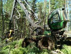 John Deere, 2010 в Усть-Илимске John Deere. Харвестер 1470E + форд 1910E