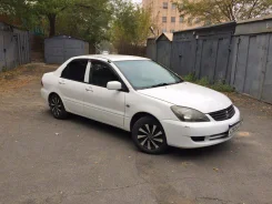 Mitsubishi Lancer. ��������, 4wd, 1.5 (90��.�.), ������, 117 638����. �� ����