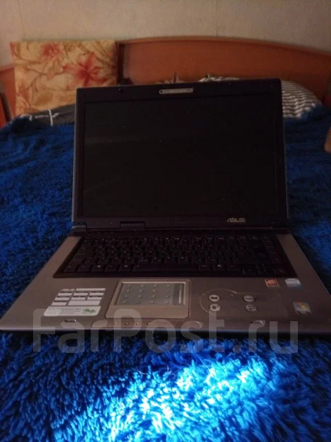 Asus X50SL. 15.4", 2,2����, ��� 2048 ��, ���� 250���, WiFi: 1, Bluetooth: 1, ����������� �� 1��. ����